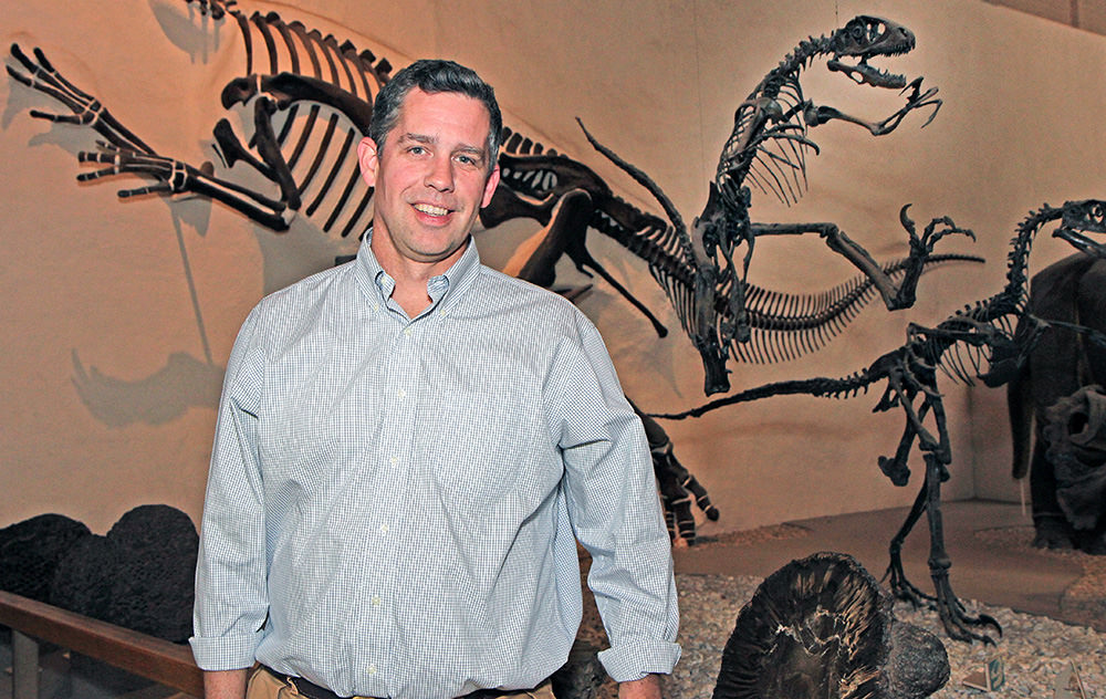 Peabody Director David Skelly in the Great Hall of Dinosaurs